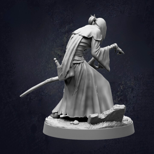 A black and white image depicting a figure in a flowing robe, holding a sword and standing on a rocky surface.