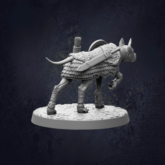A statue of a mythical creature, possibly a dragon or serpent, with a shield and a spear on its back, standing on a platform against a dark background.