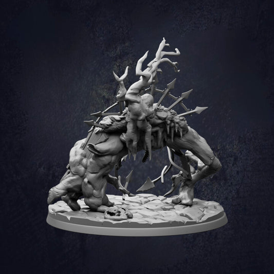 A dark, ominous statue depicting a twisted, monstrous creature with sharp teeth and claws, surrounded by a chaotic arrangement of other figures.