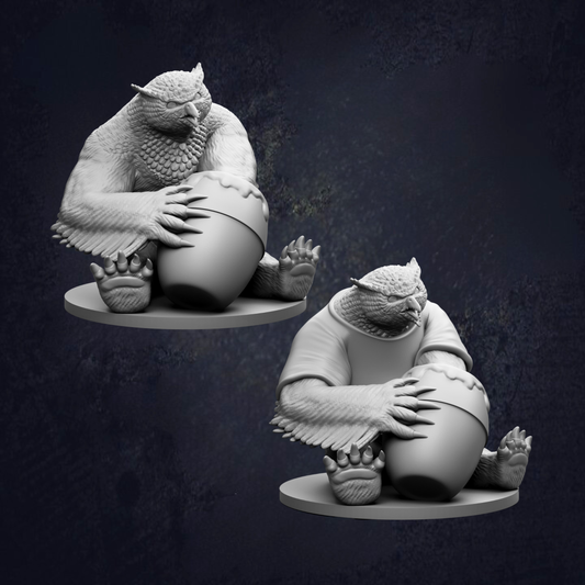 two sculptures of a large, furry creature sitting on a round base and holding a large, round object.