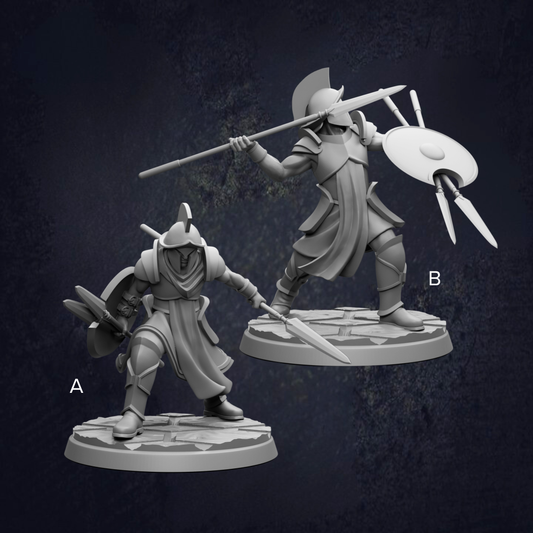 two figurines of soldiers, each holding different weapons such as spears and shields.
