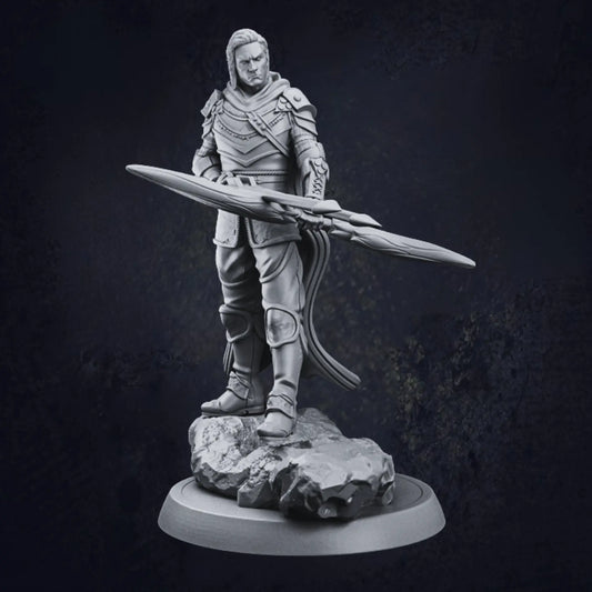 A highly detailed model of a male elven ranger, standing confidently on a rocky base. The ranger wears ornate armor adorned with intricate patterns and textures, including shoulder pads, arm guards, and knee pads. He holds a large, elaborately designed bow horizontally across his body, emphasizing his prowess as a skilled archer. High Quality and crafted from resin.