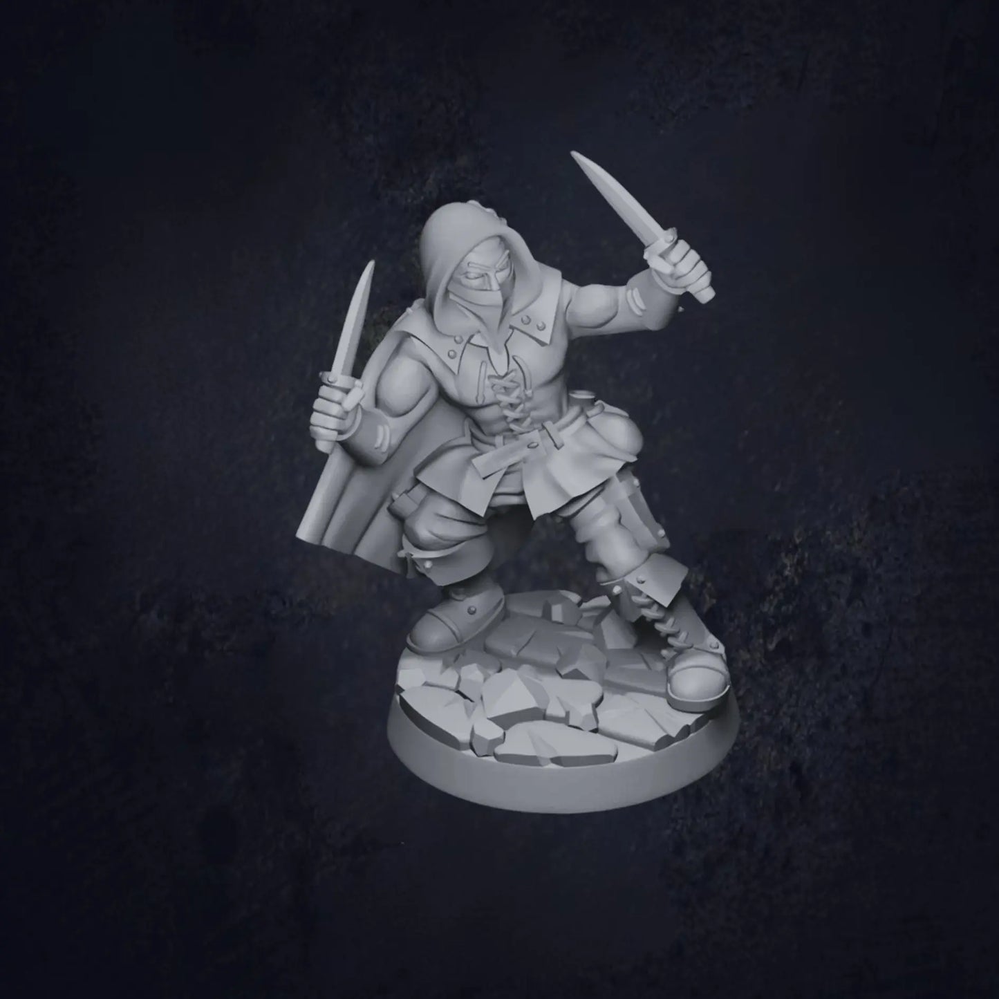 A detailed DnD miniature of a human rogue, posed in a stealthy crouch. The rogue is dressed in dark, flexible armor designed for agility, with a hood and cloak that help blend into the shadows. In one hand, the rogue holds a dagger, while the other is ready for action. The miniature's focused expression and nimble stance reflect the rogue's expertise in stealth and subterfuge, making it ideal for sneaky encounters or surprise attacks.