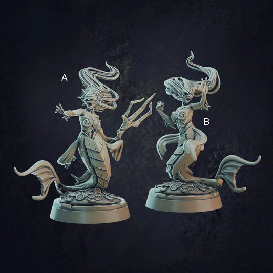 A labelled image of a set of two mermaids designed by Cast N Play at a 32mm scale. Both mermaids have flowing hair and sit upon a base of coins. The bases are at a size of 25mm and the mermaids are between 43mm - 47mm in height. They are 3D printed to a high quality in a durable resin.