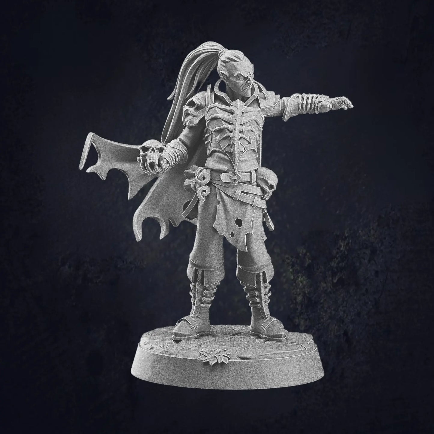 Model C Human Male Warlock ideal for dark fantasy characters, suitable for undead or vampire warriors. Posed holding a skull and an outstretched arm. The figure wears a gothic-style armor with intricate details, capes, and accessories. The design includes skull motifs, tattered clothing, and fierce expressions, enhancing his eerie and powerful presence. The model is provided on a 25mm base with a cobblestone texture.
