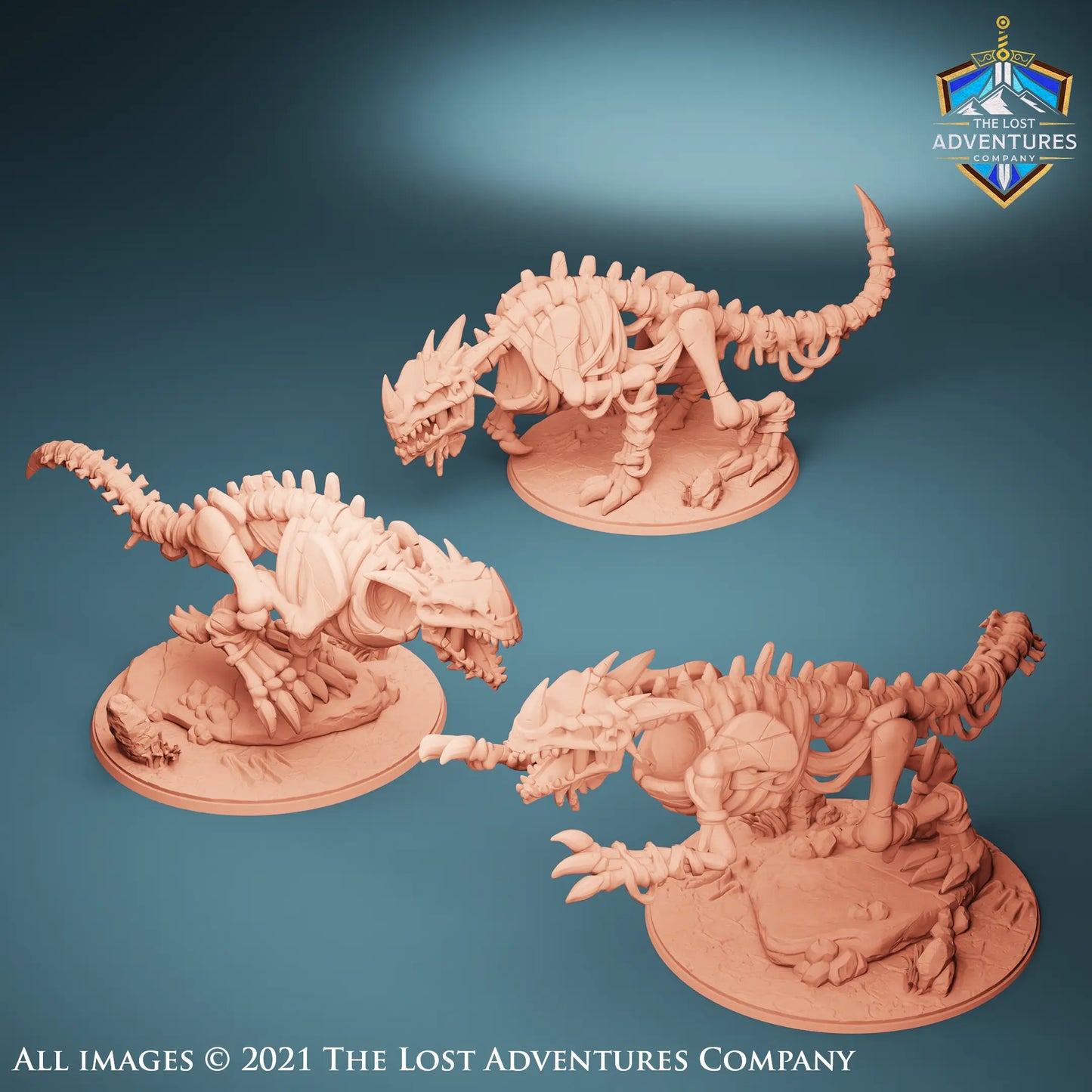 This image features three highly detailed 3D-rendered skeletal drake miniatures on circular bases, designed for tabletop gaming. The creatures have menacing bone structures, sharp teeth, and spiked tails, giving them a fearsome undead appearance. The miniatures are displayed on a blue gradient background, with "The Lost Adventures Company" logo in the top right corner. The models showcase intricate sculpting, including ribbed spines, jagged claws, and textured bases.