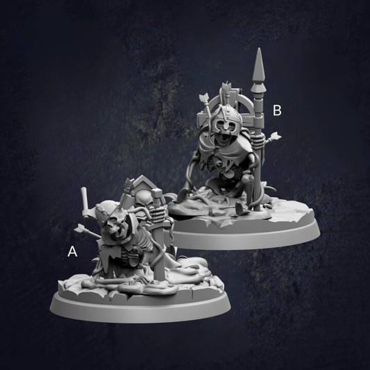 two figurines, each with a unique design and pose, set against a dark background.