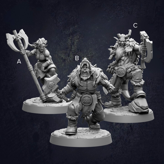 three figurines of fantasy characters, each with unique poses and weapons, set against a dark background.