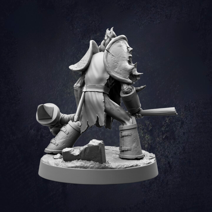 A detailed 3D model of a warrior figure, wearing a helmet and armor, standing on a rocky base and holding a weapon.