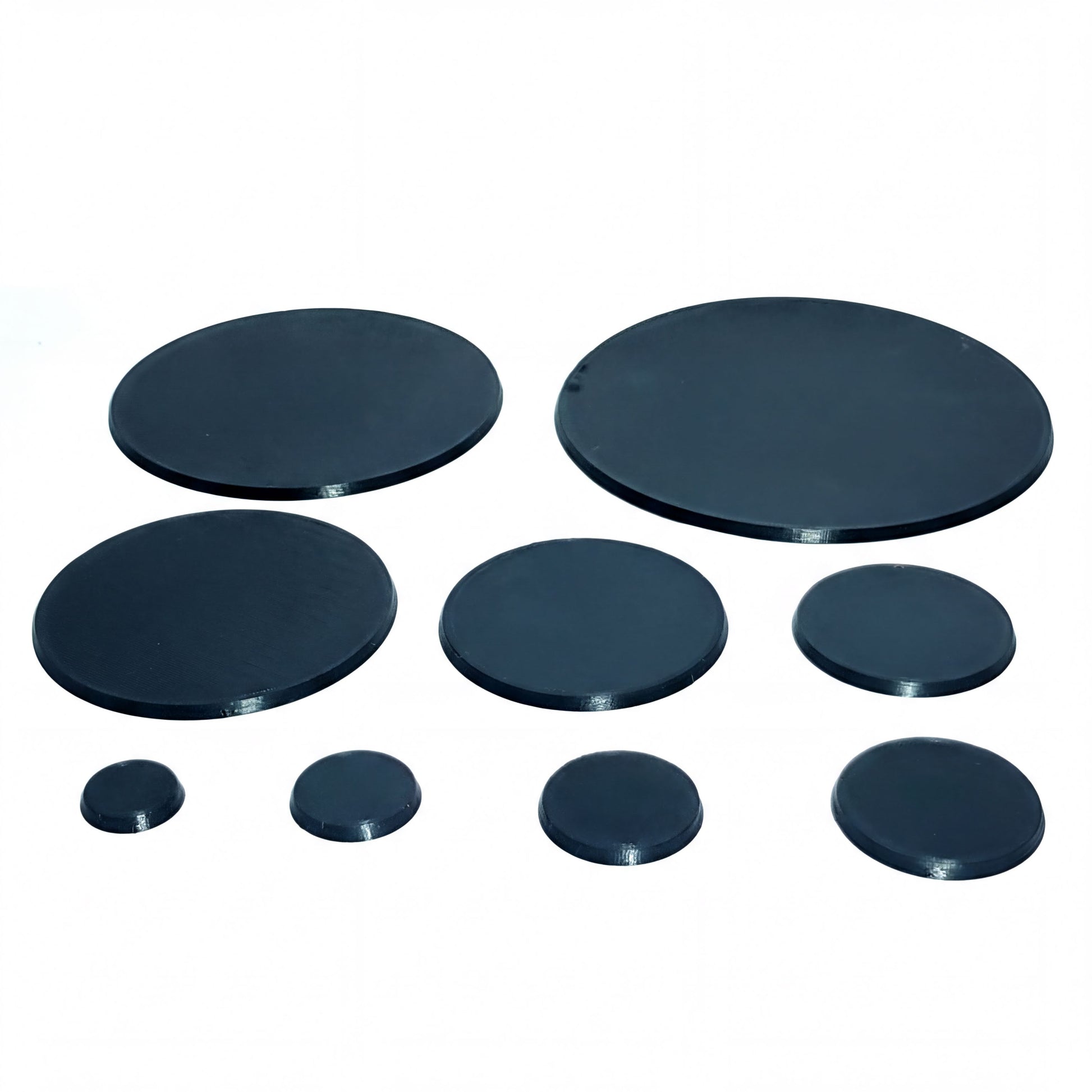 nine dark blue circular objects arranged in a grid-like pattern.