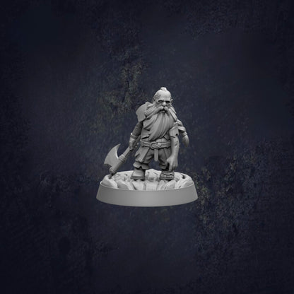 A small, detailed figurine of a bearded dwarf holding a weapon, set against a dark, textured background.