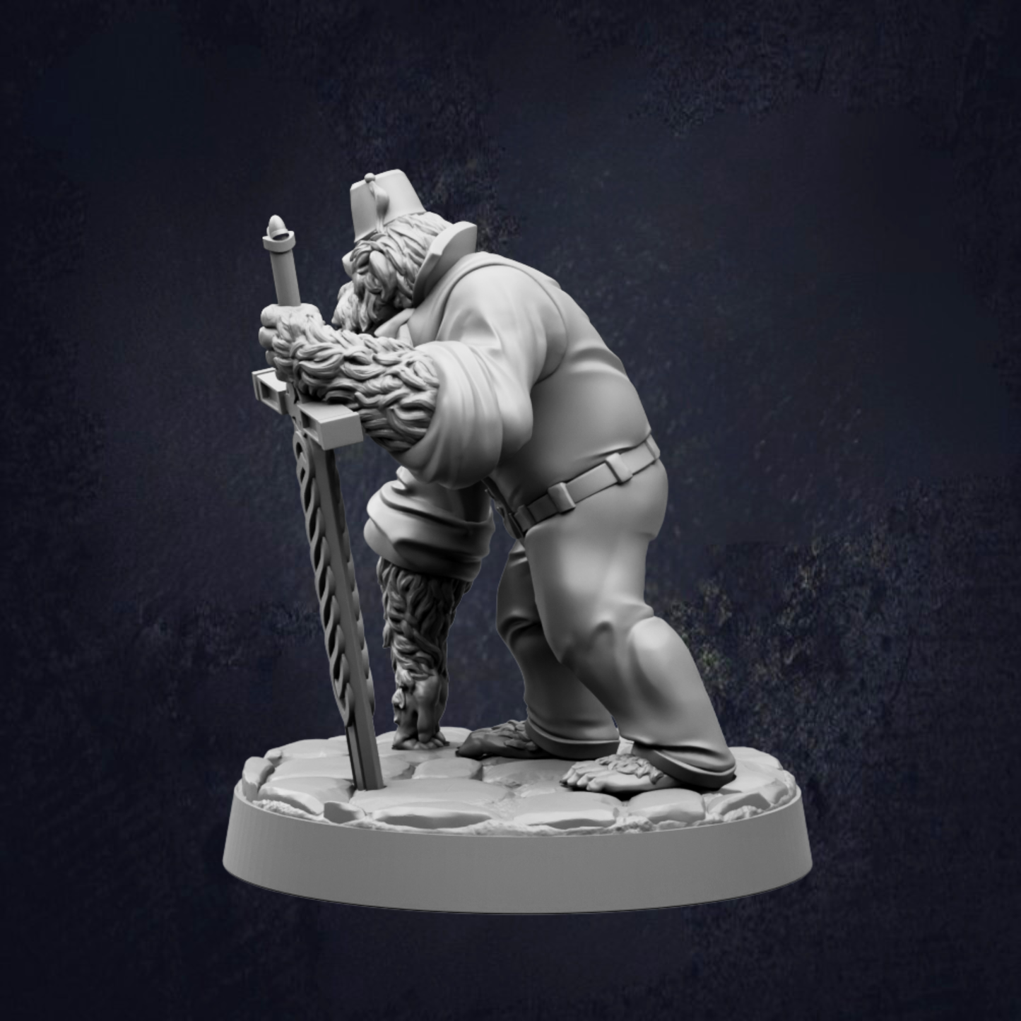 A statue of a bearded man holding a sword and standing on a rock base.