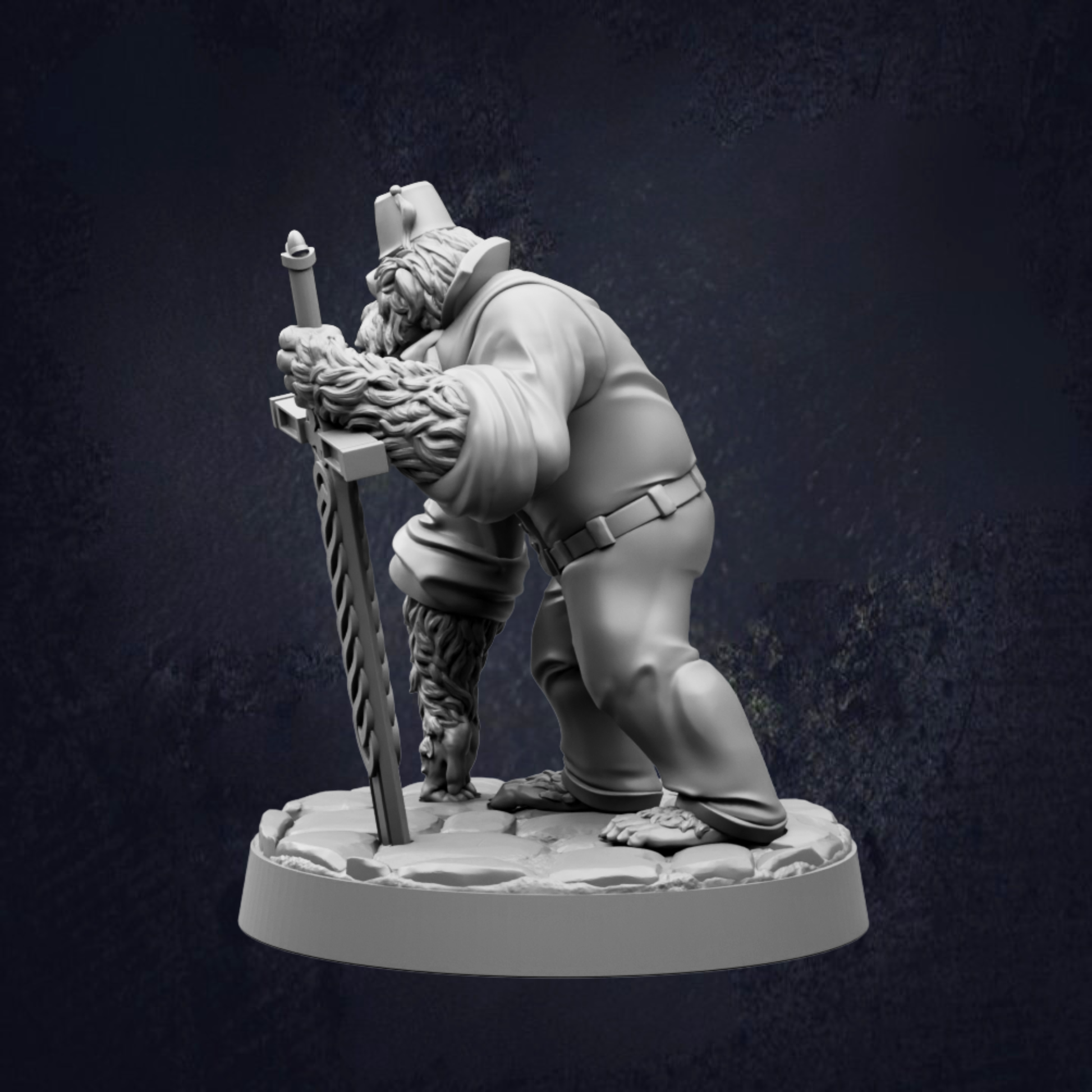 A statue of a bearded man holding a sword and standing on a rock base.