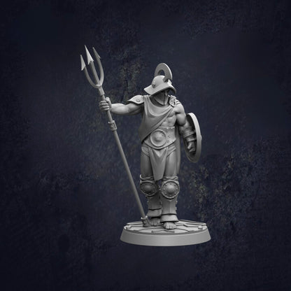 A statue of a muscular man holding a trident and shield, standing on a platform against a dark background.