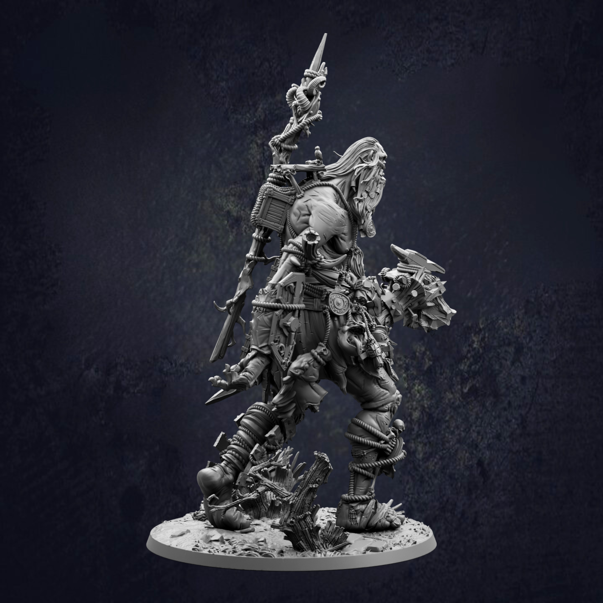 A detailed, dark-colored statue depicting a heavily armored and battle-ready warrior figure wielding various weapons and tools.