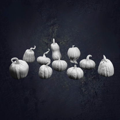 A group of nine white pumpkins arranged in a row against a dark background.