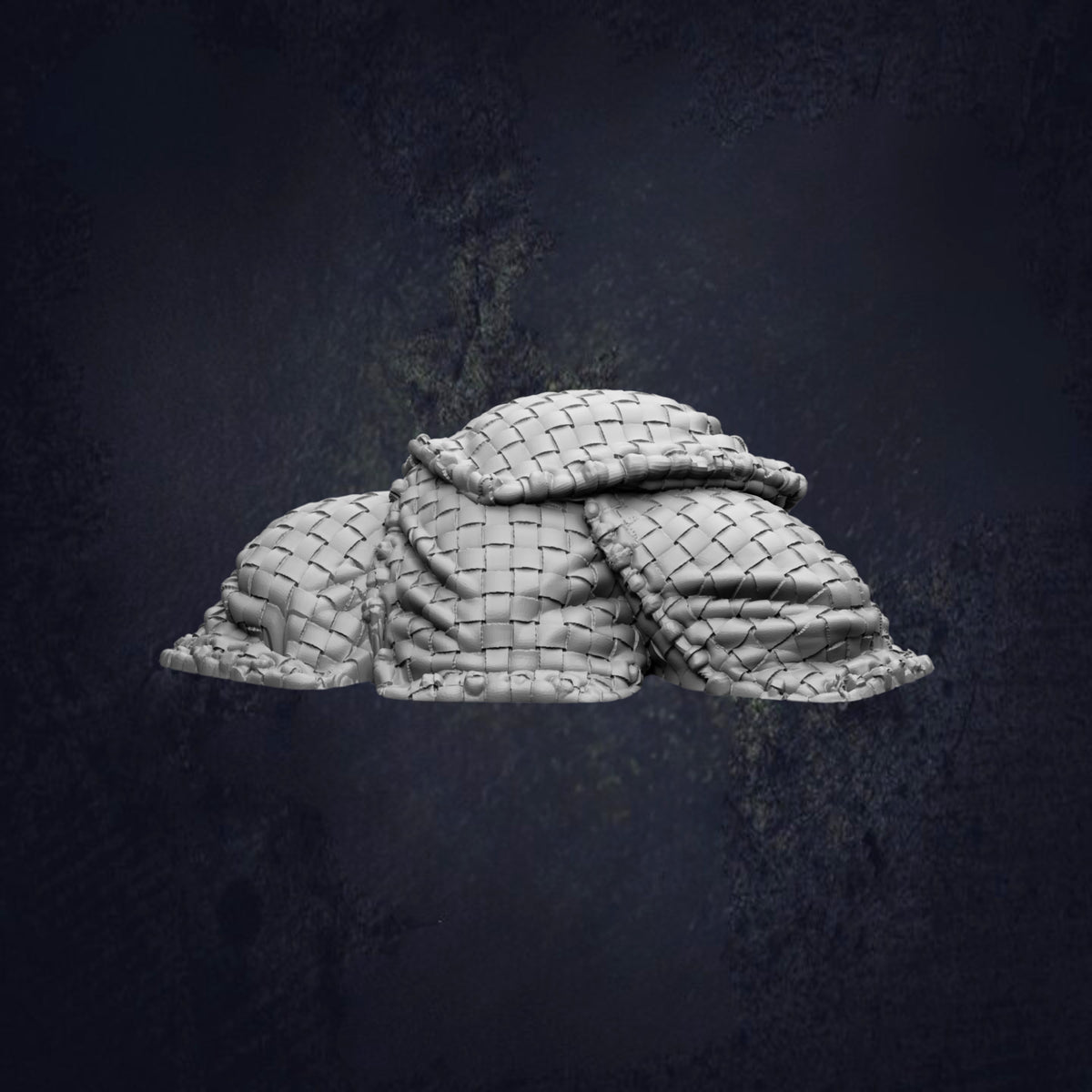 A pile of woven bags or sacks, possibly made of cloth or fabric, against a dark background.