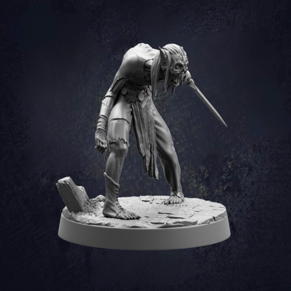 A dark, moody statue of a menacing-looking creature with a long, sharp weapon in its hand, standing on a rocky surface.