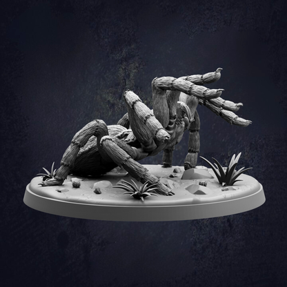 A detailed 3D model of a spider with its legs spread out, sitting on a base with plants and rocks.