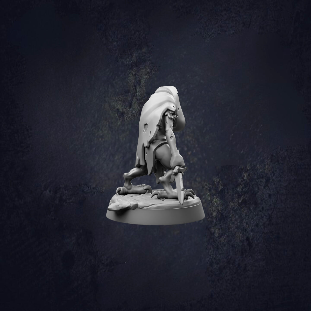 A white figurine of a person kneeling on a rock, with a cape or garment draped over their body, against a dark background.