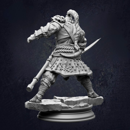 A detailed 3D model of a warrior figure, wearing armor and wielding a sword, standing on a platform against a dark background.