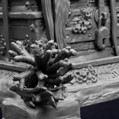 A close-up view of a detailed, intricate sculpture made of metal, featuring a complex arrangement of various textures and shapes.