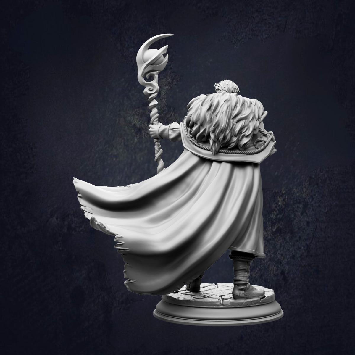 A statue of a person with long hair and a flowing cape, holding a staff or staff-like object, standing against a dark background.