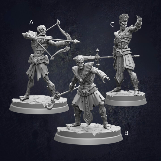 three figurines of soldiers, each with different weapons and poses, set against a dark background.