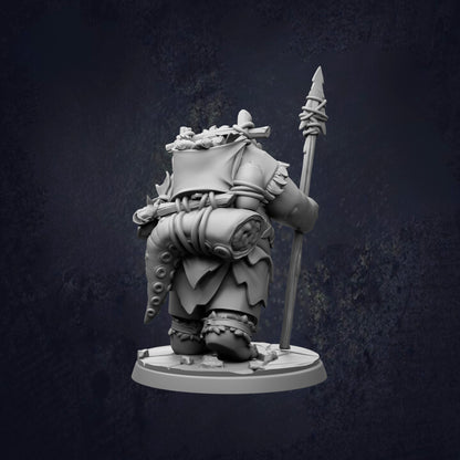 A 3D model of a character with a spear and a backpack, standing against a dark background.