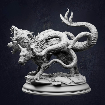 A detailed, intricate, and fantastical sculpture depicting a mythical creature with multiple heads and sharp teeth, standing on a pedestal against a dark background.