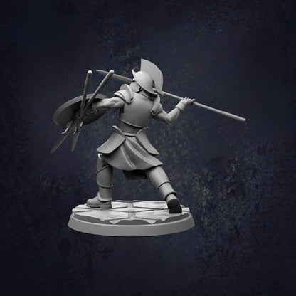 A 3D model of a warrior figure in a fighting stance, holding a spear and shield, against a dark background.