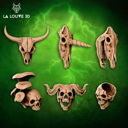 An assortment of six intricately designed skull miniatures, including animal, human, and hybrid skulls with features like horns and mushrooms. Perfect for tabletop scatter terrain or artistic decoration.