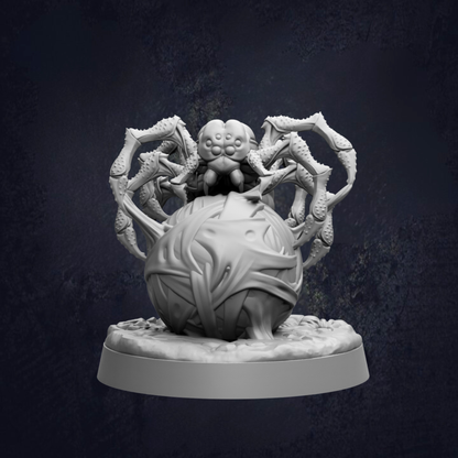 A 3D rendering of a large, intricate spider sculpture with multiple legs and a round body, set against a dark background.