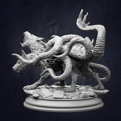 A detailed, intricate sculpture of a fantastical creature with multiple tentacles and sharp teeth, set against a dark background.