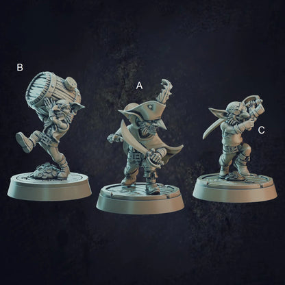 A labelled image of a set of three highly detailed 3D printed resin goblin pirates. There is a pirate captain, a goblin carrying a barrel and a sword brandishing attack posed goblin. Ideal to add to any seafaring d&d or rpg tabletop campaign. Designed by Cast N Play at 32mm scale, and on 25mm bases.