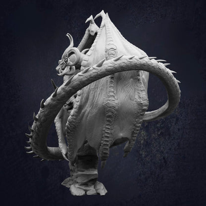 A detailed, intricate sculpture of a dragon-like creature with sharp teeth and a long, coiled tail.