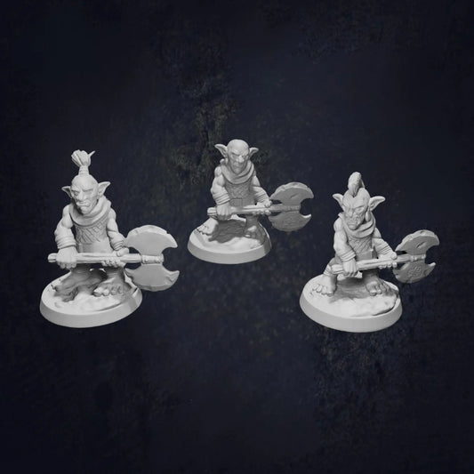 Three unpainted 3D-printed RPG miniatures of goblins wielding double-headed axes, each with unique hairstyles (ponytail, bald, mohawk), posed on round bases against a dark background. Perfect for DnD, tabletop RPGs, and wargaming, these high-quality resin miniatures are ideal for collectors, painters, and fantasy gaming enthusiasts.