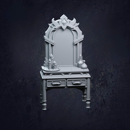 A decorative mirror for kings royal bedroom. It contains two small drawers, and has perfume bottles and candles sat on top. 