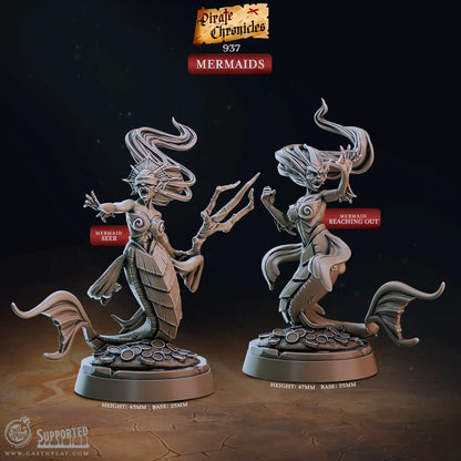 An image with text of a set of two mermaids designed by Cast N Play at a 32mm scale. Both mermaids have flowing hair and sit upon a base of coins. The bases are at a size of 25mm and the mermaids the text indicates that the seer mermaid is 43mm in height, and the reaching out mermaid at 47mm. They are 3D printed to a high quality in a durable resin.