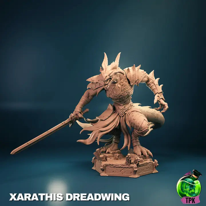 A render of a detailed 3D-printed miniature of a dragonborn fighter designed by TPK Lab. The figure features a fierce, snarling dragon-like humanoid clad in ornate, spiked armor. It holds a large sword in one hand, posed in a dynamic combat stance with its tail coiled behind and cloth elements flowing dramatically from its waist.