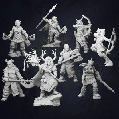 A collection of eight unpainted 3D-printed female Snow Orc miniatures posed against a dark background. The figures include fierce barbarians wielding axes and clubs, agile rangers with drawn bows, and mystical druids adorned with antlers and nature-inspired attire. Each miniature is highly detailed, showcasing unique armor, weapons, and dynamic stances—perfect for tabletop RPG adventures.