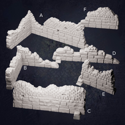 A group of ruined walls, with different shapes, sizes and battle damage shown. Including some holes  and a range of different size stones
