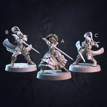 Labelled image of unpainted 32mm scale set of three female vampire hunter miniatures, each posed dynamically and standing on 30mm bases. The first model wears a Victorian-style dress and wields a sword with both hands in a battle-ready stance. The second model is clad in armor, brandishing a sword confidently. The third model, also in armor, holds a sword in one hand while posed in a dodging maneuver, evading an attack. Each figure features intricate detailing, emphasizing their warrior prowess.
