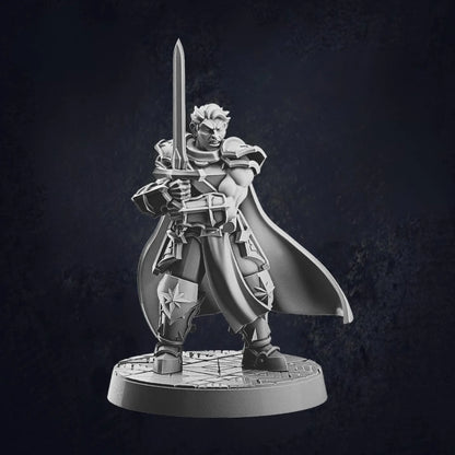 Model A - male human paladin miniature at 32mm scale designed by Cast N Play, each on 30mm bases. The male human paladin is holding a sword with both hands, ready for combat.