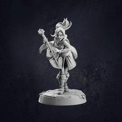 An image of Pose A of an unpainted miniature figurine of a fantasy female human bard posed dynamically with a lute. The bard has a lively expression, with windswept hair and a flowing cape. The character wears layered adventurer-style clothing, including boots, a tunic, and a cloak. The bard appears to be in mid-performance, strumming the lute with an energetic stance. The figurine stands on a round base with engraved textures, set against a dark, textured background.