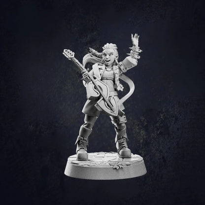 An image of Pose B of an unpainted miniature figurine of a fantasy female human bard posed dynamically with a lute. The bard has a lively expression, with windswept hair and a flowing cape. The character wears layered adventurer-style clothing, including boots, a tunic, and a cloak. The bard appears to be in mid-performance, strumming the lute with an energetic stance. The figurine stands on a round base with engraved textures, set against a dark, textured background.