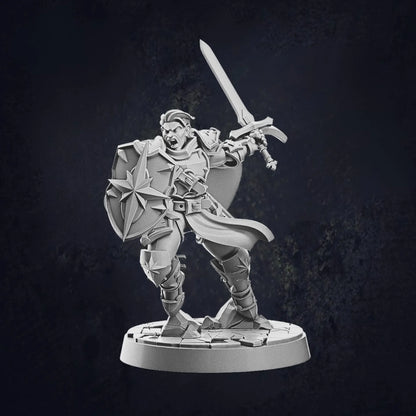 Model B - male human paladin miniature at 32mm scale designed by Cast N Play, each on 30mm bases.  The male human paladin stands in a battle pose, holding a sword and shield, displaying a defensive stance.