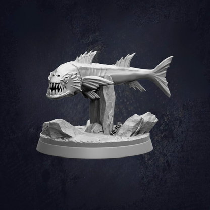 A 3D model of a fish with sharp teeth, displayed on a base with rocks and other natural elements.