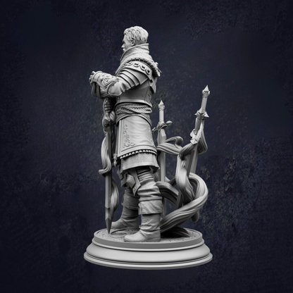 A statue of a man in a medieval-style outfit, holding a sword and standing on a pedestal.