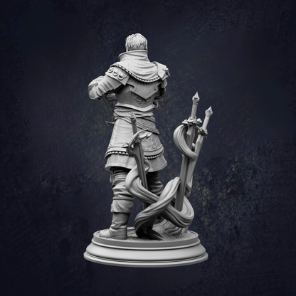 A statue of a person holding a sword and a shield, standing in a defensive stance.